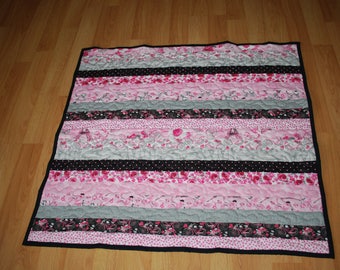 Paris print baby quilt in pink/grey/black