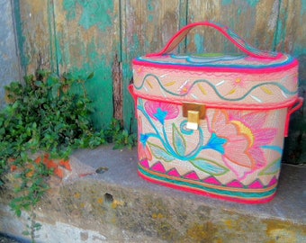 box colored handbag