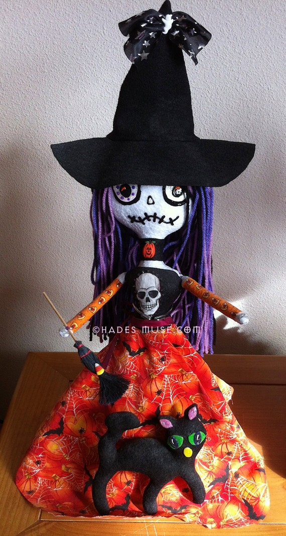 witch with voodoo doll