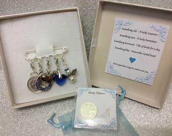 Bridal garter charm pin, wedding gift. Something old, something new, something borrowed, something blue & a silver sixpence for her shoe.
