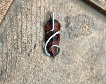 Mahogany obsidian arrowhead in sterling silver pendant