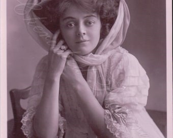 Miss Adrienne Augarde was a British Actress & Singer Postcard Portrait . Postcard Not Posted.