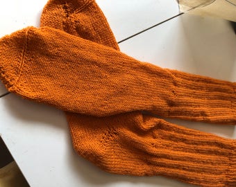 Orange hand-knitted socks