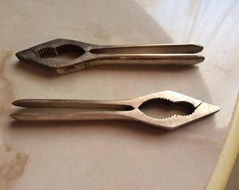 Antique set of 2 clips nuts