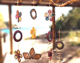 Mobile with juniper wood and creative figures
