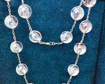 A beautiful strand of POOLS OF LIGHT. Rockin Rock Crystal!