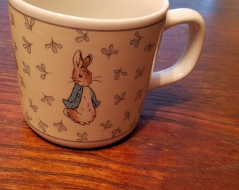 1996 Wedgwood childs cup (single handle) with Peter Rabbit images made in England