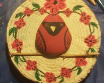Painted wood/rock cardinal wall hanging