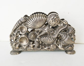 1994 silver godinger, napkin holder, sea bottom, table decoration, silver table service, seashell art,
