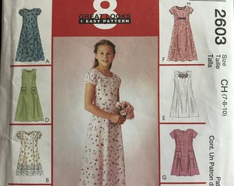 McCalls 2603 - Girl's Princess Seamed Dress with Sleeveless or Short Puff Sleeve Options - Size 7 8