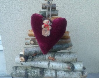 Large velvet bear with heart