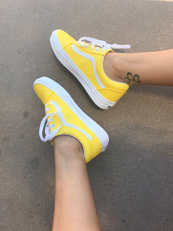 vans old skool yellow on feet