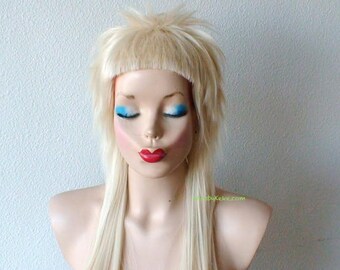 Cosplay wig. Blonde choppy layers short bangs hairstyle wig. Cosplay wig. Adult Halloween Costume wig.