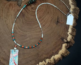 Assymetrical turquoise and coral necklace with handmade raku pendant