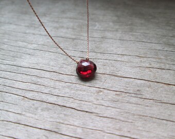 small GARNET floating stone necklace on a fine silk cord minimalist gemstone necklace January birthstone healing stone