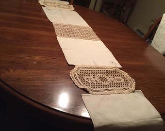 Table runner made from vintage linen and lace.