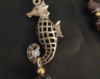 Seahorse and cultured pearls