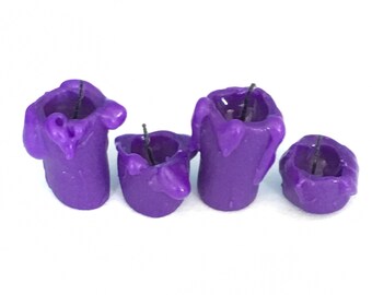 Purple dripping candles