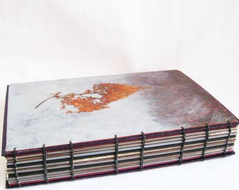 Natural Rustic Journal or sketchbook is 9 by 6 inches, this Artists Book is OOAK, open coptic binding and center pocket, unlined pages