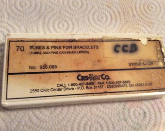 Tubes and pins for bracelets partial box