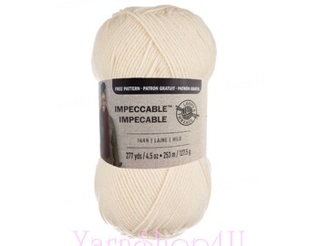 ARAN Impeccable Loops and Threads Yarn. Aran is an off-white or antique white color. 100% acrylic great for hats, scarves, blankets and more