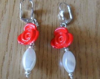 Little girl, red and white earrings