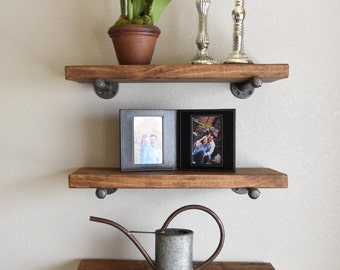 espresso floating shelves in bathroom