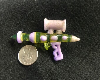 Illuminati and wysteria ray gun pendant