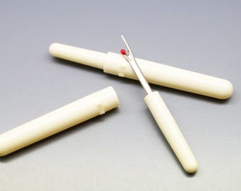 1 Ripper, razor sharp, cutting son plastic and metal handle