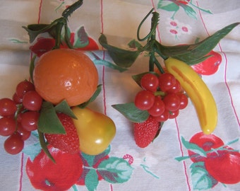 two plastic fruit sprigs