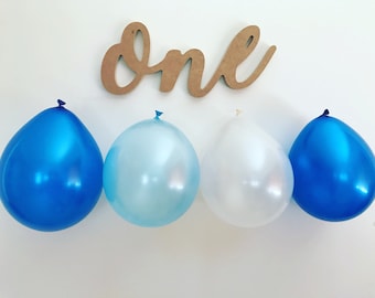 Custom first birthday “one” sign