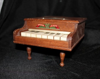 Toy Grand Piano L.H.& C. Inc.