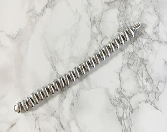 silver statement bracelet