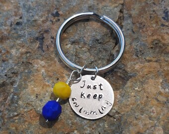 Disney's Finding Nemo "Just keep swimming" hand stamped keychain