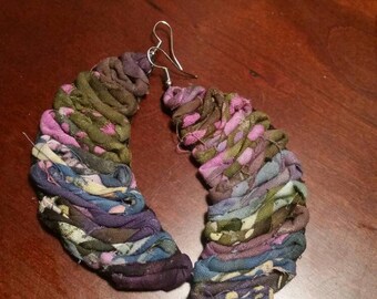 Leather "moonies" earrings with batik fabric.