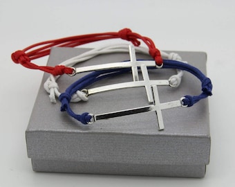 Cross and adjustable cord bracelet