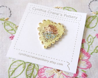 Porcelain Clay Hedgehog Button, Large Scalloped Edge Heart, Lime Green and Brown with Blue Flowers