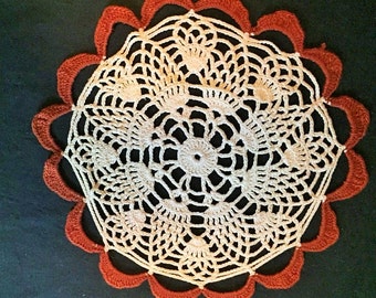 Doily - Vintage crocheted ecru and rust colored