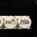 Vintage set (4) of 1940's '3 little kittens' nursery rhyme buttons.