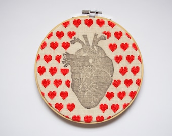 Frame with embossing and embroidery heart
