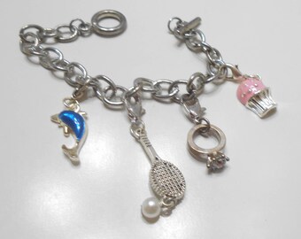 Vintage Souvenir Charm Bracelet (2515) Cupcake, Engagement Ring, Tennis Racket & Ball, And Dolphin