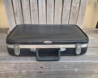 Featherlite Vintage suitcase Black wuth gray Interior, divided into 2 sections with latch closures, made is USA by Sears, Roebuck, Retro