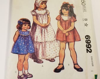 Vintage lot of childrens patterns McCalls 6992 and Simplicity 6418