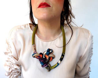 The jewel ROMANCE in fabric and rope made by hand