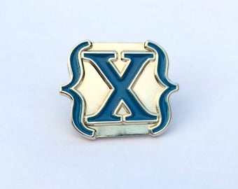 Blue IAMX {X} Logo Enamel Pin