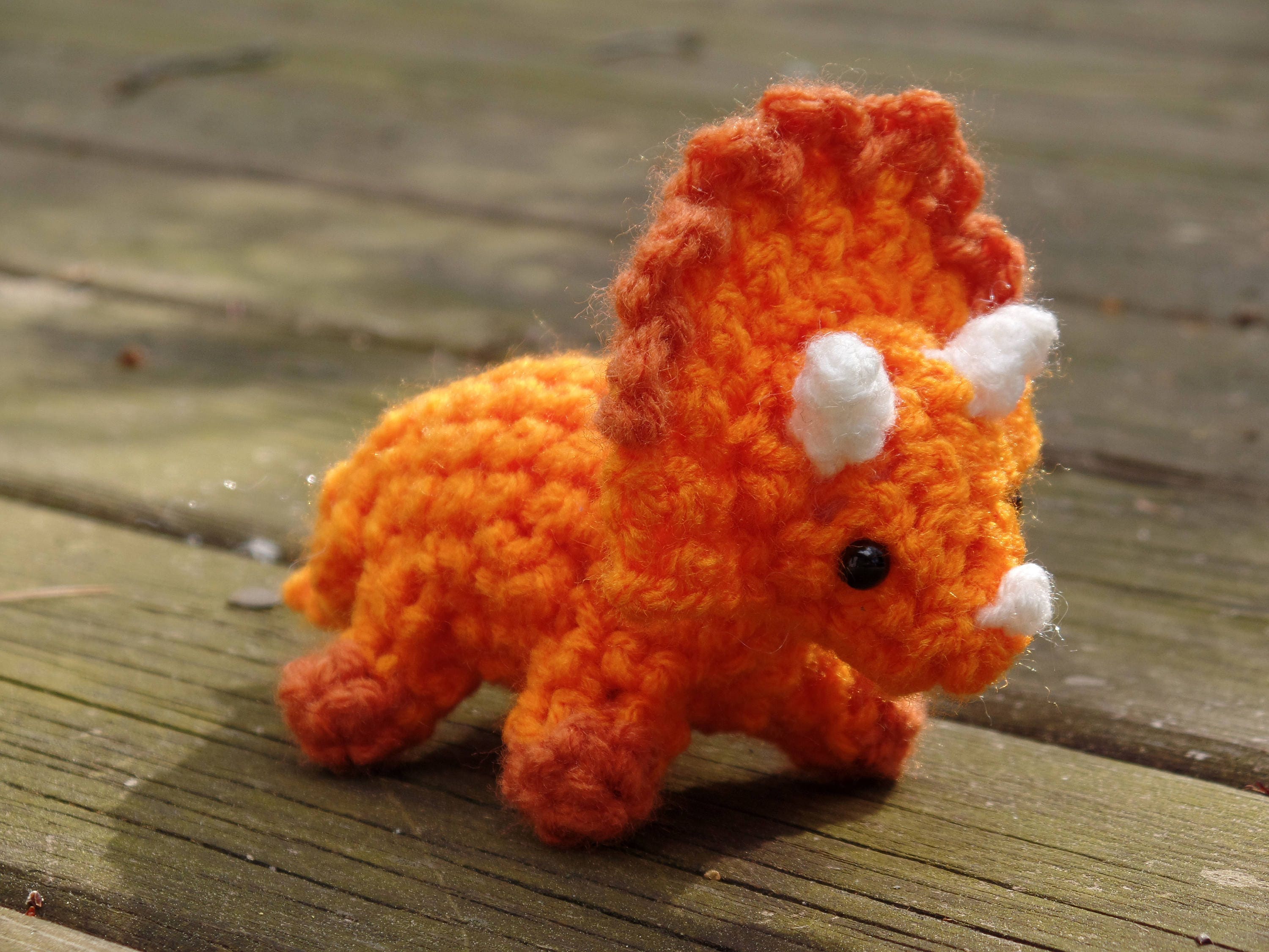 orange triceratops plush