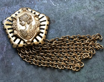 Female Figurative Brass Badge with Chain