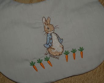 Beatrix Potter Peter Rabbit With Babies and Toddlers Cotton Soft Blue, White With Pink Trim, or White Bib Three layer Bib with a Poly Filler