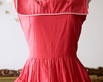 1940s pink cotton dress with large square collar, pockets and rhinestones.