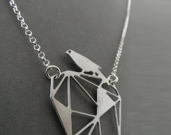silver bird necklace, bird on a rock, geometric bird necklace, geometric jewelry, silver necklace